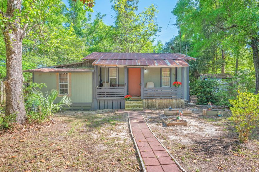 Tucked away on approximately ±0.8 acres, this charming 2 bedroom, 1 bath cabin offers a great opportunity for investors, weekend retreat seekers, or buyers ready to bring their vision to life. With 897 sq ft, this fixer upper is full of potential and comes fully furnished, making it easy to get started on renovations or enjoy it as a rustic getaway. The property features a chain link fenced area surrounding the home, perfect for pets or added privacy. A 19' x 11' workshop provides space for tools, hobbies, or additional storage. Conveniently located on a paved road with public water and septic already in place, the groundwork is there for your improvements.
Whether you're looking to renovate, invest, or create a cozy cabin retreat, this property offers character and endless possibilities.