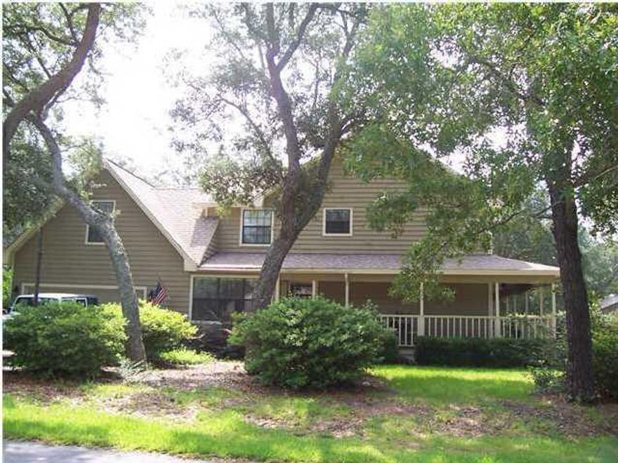 Large home with pool in a gated neighborhood?  Located in Southwind at Bluewater Bay.  This home is situated on a large corner lot with mature trees and shaded.  Enjoy the outdoors from the wrap around porch  or screened in ground pool Home is in need of repairs but is very livable. All bedrooms are upstairs and siding does have some wood rot. Original roof, no leaks. Not VA approved