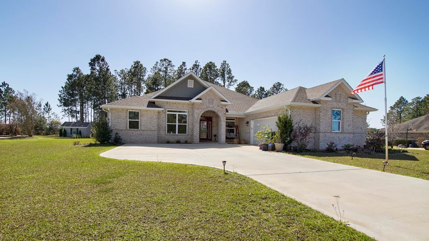 Don't miss this incredible opportunity to own a stunning home in the gated community of Windswept Estates. Situated on 0.81 acres, this beauty features a large open floor plan with soaring 12-ft ceilings, crown molding, and an abundance of natural light. The gourmet kitchen is designed to impress, offering stainless steel appliances, granite countertops, and plenty of prep space for effortless entertaining. The master suite is a true retreat with an extra sitting area, perfect for a home office or cozy reading nook. A spacious laundry room adds extra convenience. Property is located in a FEMA Flood Zone X - no flood insurance required.