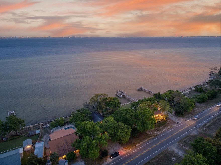 This is what people dream about...
Wide-open bay views, peaceful mornings, and sunsets that never get old.

Sitting on a .24-acre waterfront lot, this property is all about the location. The existing home is being sold as is, giving you the opportunity to renovate, rebuild, or create something completely your own.

If you've been waiting for the right waterfront lot to come along--this might be it. Opportunities like this don't come around often.