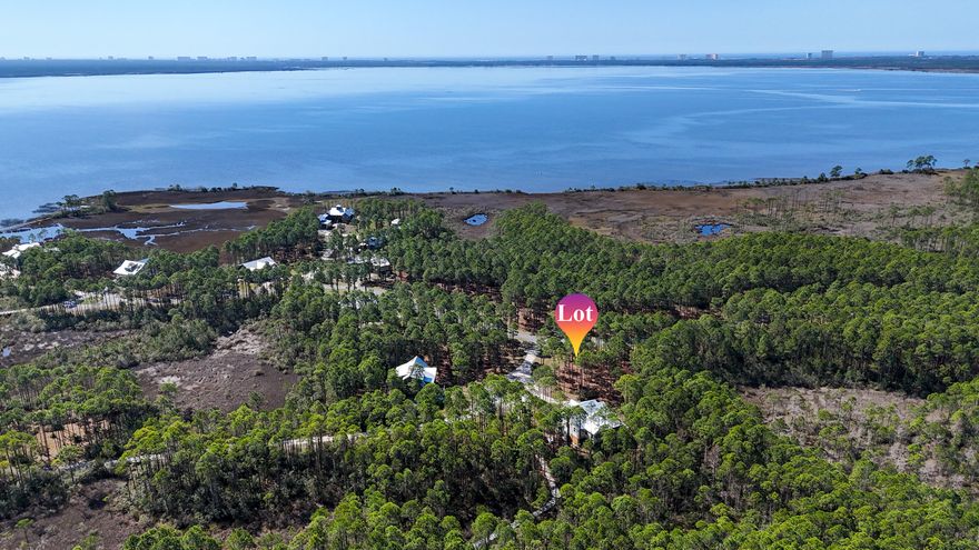 Build your dream home in one of Northwest Florida's most desirable gated waterfront communities. This beautiful vacant homesite is ideally positioned on a quiet cul-de-sac in the serene and tranquil RiverCamps on Crooked Creek, offering privacy, natural beauty, and exceptional access to the water. RiverCamps is a thoughtfully designed, amenity-rich community surrounded by protected conservation land and scenic waterways. Residents enjoy a gated entrance, stunning waterfront pool and clubhouse, pool pavilion, miles of boardwalks and nature trails, private boat launch, boat wash station, campground, and RV/boat parking. Spend your days exploring the water with community kayaks and paddleboards, fishing from the docks, or enjoying breathtaking sunsets over Crooked Creek. For boating enthusiasts, RiverCamps provides deep water access leading directly to the Intracoastal Waterway and the Gulf of America, making it easy to enjoy world-class fishing, boating, and waterfront dining. Despite its peaceful, nature-filled setting, the community is conveniently located just minutes from the white-sand beaches of Panama City Beach, Northwest Florida Beaches International Airport (ECP), 30 Avenue, shopping, dining, and entertainment. If you're looking for a rare opportunity to build in a private, waterfront-focused community that blends luxury living with untouched natural beauty, this exceptional cul-de-sac lot in RiverCamps on Crooked Creek is the perfect place to start.