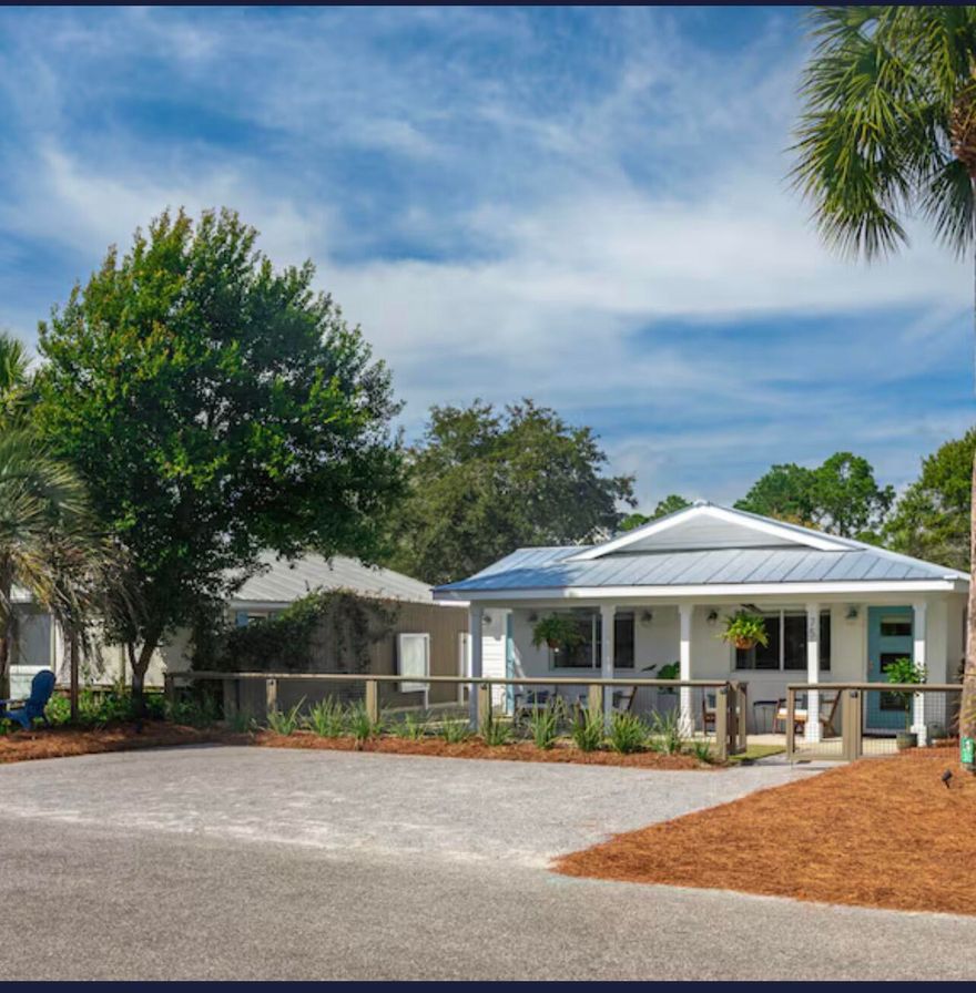 Welcome to the Bluefish Coastal Cottage -- a beautifully renovated 3-bedroom, 2-bathroom beach retreat in Blue Mountain Beach on Scenic 30A. Fully remodeled in 2017 in a coastal-modern style, this charming home delivers comfort, craftsmanship, and an unbeatable location just an 8 to 10-minute walk to the sugar-white sands of the Gulf of America. Inside, the open-concept living and dining area impresses with soaring pine ceilings, classic shiplap walls, and abundant natural light. The gourmet kitchen features a gas range and modern appliances. Pine ceilings carry throughout every bedroom, adding warmth and character home-wide. The owner's suite offers a king bed, double-vanity ensuite with a beautifully tiled walk-in shower, and private deck access. Two additional guest bedrooms share a spacious full bath, also finished with designer tile work. Outside, an elevated back deck features a private hot tub/spa, Weber gas grill, 6-person dining area, and outdoor shower surrounded by swaying palms. Fenced yard and parking for 3 vehicles plus a golf cart. A short walk to Blue Mountain Beach access and minutes from Gulf Place, Grayton Beach, and Seaside. This rare 30A gem is as move-in ready as it gets. Every inch of the Bluefish Coastal Cottage has been thoughtfully designed and meticulously maintained, offering the kind of quality and character that's hard to find at this price point on Scenic Highway 30A. The shiplap walls and pine ceilings throughout give the home an authentic coastal warmth, while the designer tile showers and modern finishes ensure nothing feels dated or overlooked.
The outdoor living space is truly a standout -- a private hot tub under string lights, a gas grill, a 6-person dining area, and a fenced yard create an entertainer's paradise that guests and owners alike will love. With parking for up to 3 cars plus a golf cart, and beach gear already on site, the lifestyle here is effortless.
Whether you're searching for a full-time residence, a personal vacation retreat, or a high-performing investment property, this cottage delivers on all fronts. With 125+ five-star reviews and a Loved by Guests distinction on VRBO, the rental income potential is proven and substantial. Blue Mountain Beach is one of the most sought-after and uncrowded stretches of 30A -- and this cottage puts you right in the heart of it.
Your 30A dream starts here.
