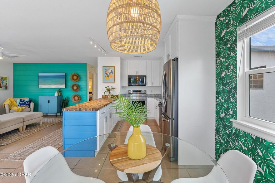 Ideally positioned just 600 feet from dedicated beach access #87, this updated duplex bungalow blends modern coastal design with the charm of classic Old Florida. Situated on a spacious corner lot, the property offers both turn-key functionality and long-term potential, making it a compelling opportunity for investors or multi-generational living.

Each level is thoughtfully designed with open-concept living and dining areas, allowing the interiors to feel bright, spacious, and inviting. The ground-floor unit features one bedroom with a king-size bed, a full bath, and a bonus trundle room for additional guests. Upstairs, the two-bedroom layout offers ample space and panoramic Gulf views from the expansive deck--perfect for dining al fresco or basking in the sea breeze.