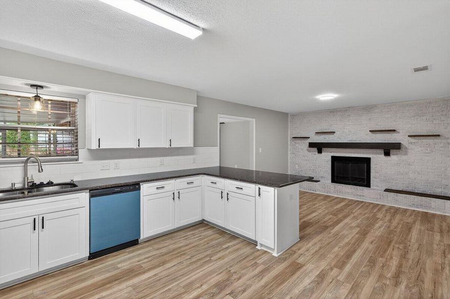 Renovated all-brick 5BR/2BA home, its only minutes to Eglin and Hurlburt Field from this highly desirable Kenwood neighborhood. Major updates include a 2024 Roof, 2026 HVAC, 2026 Water Heater, and brand new wiring. new fans and lighting, all new flooring, fresh interior paint.

A chef's dream Kitchen greets you, graced with spacious granite countertops, a large island, soft-close cabinets, and new stainless steel appliances. Enjoy a spacious master suite with a hot tub, updated baths, tile floors in bathrooms ,
huge family room. Extremely neat, with an office space, and a private upstairs bedroom ideal for a theater or gaming room or an extra big bedroom. Outside, enjoy a large backyard and a back porch with a sink and cabinets. Truly move-in ready