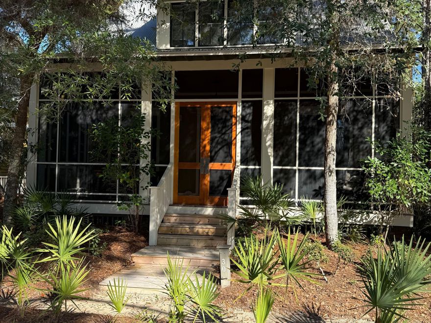 Positioned within the highly sought-after Phase II of WaterColor, this thoughtfully designed cottage offers the rare balance of privacy and proximity to the area's most celebrated amenities.Set along a charming pocket park where neighbors gather for bocce ball, lawn games and relaxed afternoon picnics, the home enjoys a peaceful setting that still places you moments from the beach and vibrant energy of Scenic Highway 30A.
Inside, 10-foot ceilings and rich hardwood floors create a light, inviting atmosphere. The main living area is anchored by a striking all-brick fireplace that adds warmth and architectural character while creating a natural gathering place for family and friends after a day along the coast.

The kitchen is designed to....... ........satisfy both everyday living and entertaining with equal ease. Granite countertops pair with a re-tiled backsplash and stainless steel appliances, while a Viking Professional range elevates the culinary experience. A generous breakfast bar island with an integrated sink seamlessly connects the kitchen to the living area, creating a welcoming space for casual meals, conversation and evening gatherings.

Thoughtful upgrades continue throughout the home. A Rinnai endless hot water system ensures comfort and efficiency, while upgraded media wiring supports modern connectivity for work or relaxation. Just off the side entrance, a well-appointed utility room adds another layer of convenience with custom cabinetry and drawers, washer and dryer, a Uline mini-fridge and a dedicated sink--an ideal space for organization after beach days or pool afternoons.

Outdoor living is equally effortless. Just steps away, the outdoor shower provides the perfect place to rinse off after returning from the pool or the white sand beaches along the nearby gulf.

Life here extends well beyond the front door. Residents of WaterColor enjoy access to an exceptional collection of amenities, including 10 community pools, the renowned Beach Club with three pools and three dining venues, and Camp WaterColor featuring multiple pools and a winding lazy river. More than 35 miles of scenic walking and biking trails weave through the community, while pickleball courts, a tennis center with Har-Tru courts and paddleboard access on Western Lake provide endless ways to enjoy the coastal lifestyle.

Classic craftsmanship, thoughtful details and an enviable setting along 30A make this cottage a timeless retreat designed for both quiet moments and memorable gatherings.