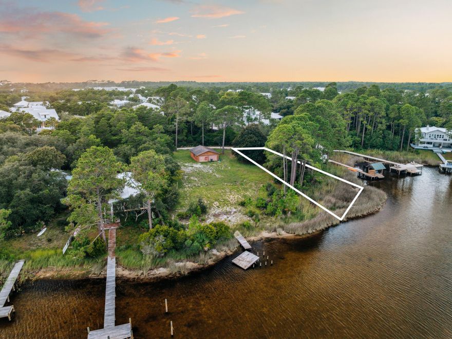 A rare opportunity to own a premier lakefront homesite on iconic Eastern Lake, Lot 9 offers a serene blend of privacy, natural beauty, and refined coastal living just south of Scenic Highway 30A.

Gently positioned along the water's edge, this homesite captures tranquil lake views framed by mature greenery and a peaceful, tucked-away setting. One of the area's rare coastal dune lakes, Eastern Lake offers direct access to paddleboarding, kayaking, and boating--creating a unique connection between calm freshwater and the Gulf beyond. Located in the eastern corridor of Seagrove Beach, the property is just moments from the shops, dining, and coastal charm of Seaside, Alys Beach, WaterColor, and Rosemary Beach, while maintaining a sense of quiet retreat.

For those seeking to expand their vision, the two adjacent lakefront lots are also available, presenting a unique opportunity to create a private compound or legacy property in one of 30A's most desirable settings.

Thoughtfully positioned and rich in natural surroundings, Lot 9 offers an exceptional canvas to build a custom residence that embraces both lifestyle and location.