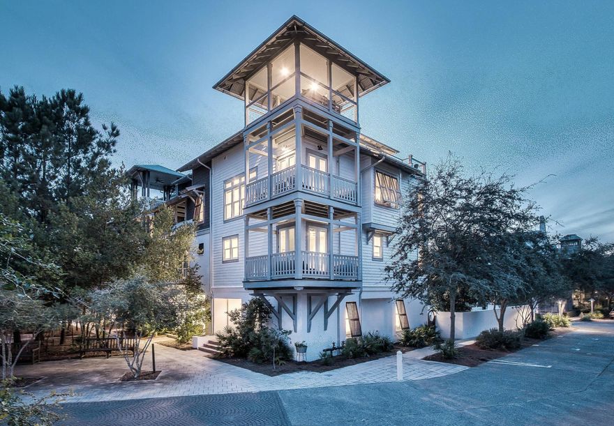 Welcome to 5 Johnstown Lane, an exquisite four-story home situated in the heart of Rosemary Beach that is the LOWEST PRICE HOME PER SQUARE FOOT on the market in Rosemary Beach! And to top it off, the highly-motivated seller is offering a $50,000 CONCESSION towards upgrades and improvements! Overlooking the St. Augustine Green in Rosemary Beach, this fully-furnished, elevator-equipped, four-story home is a must-see! Enjoy the panoramic views of the lush greenery and Rosemary Beach from every level, featuring balconies on the second, third, and fourth floors. One of our favorite features of this home is the wrap-around rooftop balcony. This is one of only 13 homes in Rosemary Beach with a tower designation, so the view over the hundreds of other homes is incredible! The allure continues with APPROVAL from the town architect for a PRIVATE POOL or CARRIAGE HOUSE to enhance the outdoor experience if desired.

With its reverse floor plan and wrap-around balconies, the only tough choice you'll make once you arrive is which views to enjoy and where.  This beautiful residence is light and bright, decorated in neutral colors and illuminated by natural light flooding in through the many windows. The rustic modern fixtures throughout complement the gorgeous dark wood floors beautifully. 

This lovely 4-story home is equipped with a private elevator and accommodates up to 15 people with 5 bedrooms, 4.5 baths, plus an additional bunk room; great for multiple families with over 3,500 sq ft of space. There are two guest suites and a wet bar on the first floor, each room complete with a king bed, private bath with custom tile shower, and a large closet. 

Another guest suite, as well as the master suite, can be found on the 2nd floor, each with a king bed, private bath, and walk-in closet. The master suite features a private balcony, a wet bar, double vanities, a large soaking tub with treetop views, and a custom tile shower. 

Continuing upward, the kitchen, living, dining and powder room are located on the 3rd floor with an open concept and an abundance of light. The kitchen is full of upgrades, including granite counter tops, a wine cooler, stainless steel decor, Kitchen Aid appliances, and a custom backsplash. There is another wrap-around balcony overlooking St. Augustine Green off the living room where the grill is located conveniently close to the kitchen. 

The fourth floor completes this residence with additional living space, a bunk room with three twin beds, and a wrap-around roof top balcony, where you can relax and enjoy sunset views and concerts in St. Augustine Park.

This home not only captures stunning views of the St. Augustine Green from every level, but is also in a great location. There is a water park with a splash pad for the kids and adults to cool off just beyond the front door. Not to mention the dining and shopping of Rosemary Beach's town square is a short 3 minute walk or quick bike ride away. Enjoy the exclusive amenities of Rosemary Beach, including four community pools, an owner's-only club just steps away from 5 Johnstown Lane, tennis courts, expansive green spaces, a gym, fitness trails, and much more. 

Come discover a world of luxury, comfort, and relaxation in this Rosemary Beach retreat!