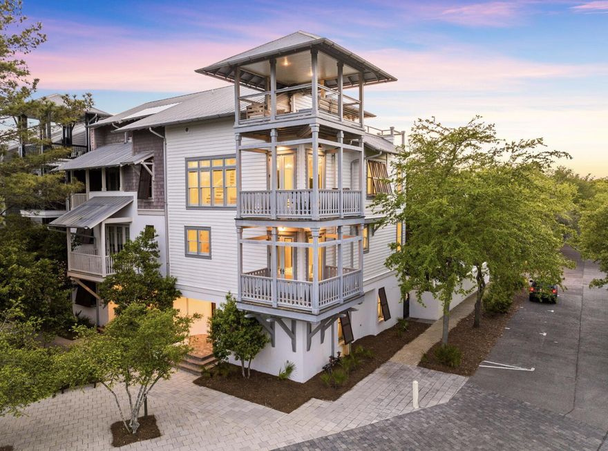 Welcome to 5 Johnstown Lane, an exquisite four-story home situated in the heart of Rosemary Beach that is the LOWEST PRICE HOME PER SQUARE FOOT on the market in Rosemary Beach! And to top it off, the highly-motivated seller is offering a $50,000 CONCESSION towards upgrades and improvements! Overlooking the St. Augustine Green in Rosemary Beach, this fully-furnished, four-story home is a must-see! Enjoy the panoramic views of the lush greenery and Rosemary Beach from every level, featuring balconies on the second, third, and fourth floors. One of our favorite features of this home is the wrap-around rooftop balcony. This is one of only 13 homes in Rosemary Beach with a tower designation, so the view over the hundreds of other homes is incredible! The allure continues with APPROVAL from the town architect for a PRIVATE POOL or CARRIAGE HOUSE to enhance the outdoor experience if desired.

With its reverse floor plan and wrap-around balconies, the only tough choice you'll make once you arrive is which views to enjoy and where.  This beautiful residence is light and bright, decorated in neutral colors and illuminated by natural light flooding in through the many windows. The rustic modern fixtures throughout complement the gorgeous dark wood floors beautifully. 

This lovely 4-story home is equipped with a private elevator and accommodates up to 15 people with 5 bedrooms, 4.5 baths, plus an additional bunk room; great for multiple families with over 3,500 sq ft of space. There are two guest suites and a wet bar on the first floor, each room complete with a king bed, private bath with custom tile shower, and a large closet. 

Another guest suite, as well as the master suite, can be found on the 2nd floor, each with a king bed, private bath, and walk-in closet. The master suite features a private balcony, a wet bar, double vanities, a large soaking tub with treetop views, and a custom tile shower. 

Continuing upward, the kitchen, living, dining and powder room are located on the 3rd floor with an open concept and an abundance of light. The kitchen is full of upgrades, including granite counter tops, a wine cooler, stainless steel decor, Kitchen Aid appliances, and a custom backsplash. There is another wrap-around balcony overlooking St. Augustine Green off the living room where the grill is located conveniently close to the kitchen. 

The fourth floor completes this residence with additional living space, a bunk room with three twin beds, and a wrap-around roof top balcony, where you can relax and enjoy sunset views and concerts in St. Augustine Park.

This home not only captures stunning views of the St. Augustine Green from every level, but is also in a great location. There is a water park with a splash pad for the kids and adults to cool off just beyond the front door. Not to mention the dining and shopping of Rosemary Beach's town square is a short 3 minute walk or quick bike ride away. Enjoy the exclusive amenities of Rosemary Beach, including four community pools, an owner's-only club just steps away from 5 Johnstown Lane, tennis courts, expansive green spaces, a gym, fitness trails, and much more. 

Come discover a world of luxury, comfort, and relaxation in this Rosemary Beach retreat!