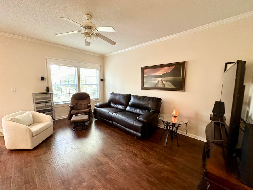 LESS THAN 10 MINUTES TO THE BEACH! This beautifully maintained, low-maintenance townhome offers the perfect blend of comfort, convenience, and coastal living. Featuring a new roof (2022) and no carpet throughout, this move-in ready home is ideal for full-time living, a second home, or an investment property(tenant currently in place $2200/mo) near 30A with a 30-day minimum rental policy.  The open-concept main living area creates an inviting space for entertaining, while the private back deck is perfect for relaxing after a day at the beach. Upstairs, the spacious split-bedroom floor plan includes an oversized primary suite with a large walk-in closet and en suite bath. Two additional generously sized bedrooms share a full bathroom, providing plenty of space for family and guests.   Residents enjoy access to a community pool, a highly desirable location close to shopping, dining, Publix, Ascension Sacred Heart Hospital, and movie theater. Conveniently located near 30A beaches, this Florida townhome offers easy living with minimal upkeep in one of the area's most sought-after locations. No additional grounds keeping or pool maintenance expenses as they are included in the manageable HOA of $295/mo. For investors, there is currently a tenant in place at $2200/mo
