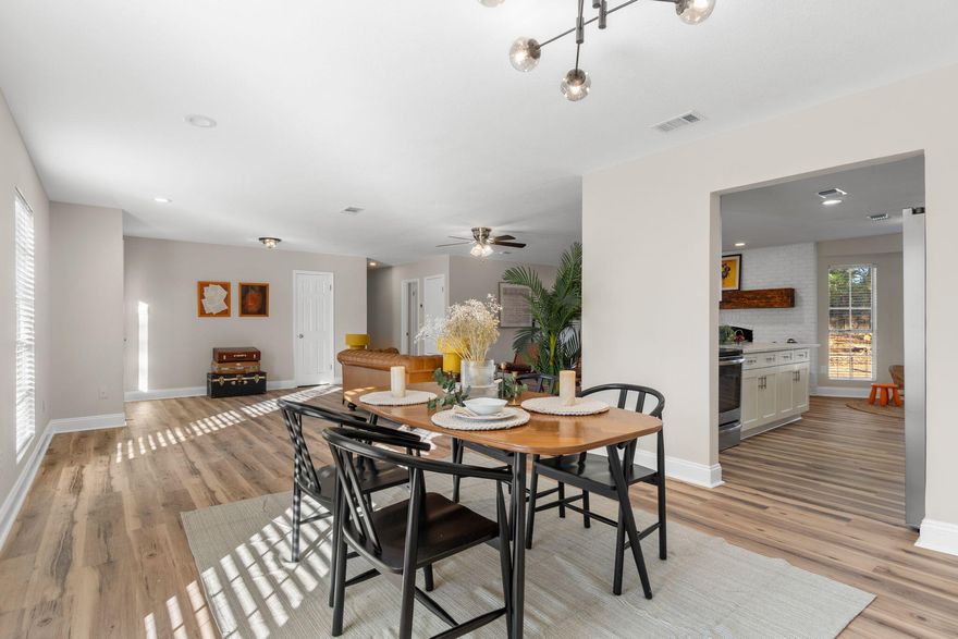 Now offered at $349,915 after a significant price adjustment, a move that has already brought renewed attention and activity.
Wake up to quiet mornings where rustling leaves replace traffic noise and nearly a full acre of level, usable land stretches beyond your back door. This fully remodeled four-bedroom, two-bath home blends modern finishes with the kind of space that is becoming harder to find.
Step inside and feel the openness immediately. Luxury vinyl plank flooring runs throughout, leading into a bright, open layout filled with natural light. The kitchen is both clean and functional, featuring quartz countertops, soft-close cabinetry, and stainless steel appliances, all complemented by updated LED recessed lighting and modern fixtures. The living room centers around a wood-burning fireplace with modern farmhouse styling, a warm focal point that anchors the space. Generously sized bedrooms provide flexibility, while both bathrooms are finished with granite countertops and custom tile showers. The primary suite includes a tiled walk-in shower, offering a well-finished private retreat.
Step outside and the difference becomes clear. The level yard offers a mix of open space and mature trees, ideal for gardening, entertaining, adding a workshop, installing a pool, or simply enjoying the outdoors at your own pace. With no HOA, the flexibility here is something many buyers are actively searching for and rarely finding at this price point.
Major updates include a new HVAC system and new water heater, making this home truly move-in ready.
Homes with this combination of land, updates, and price point do not tend to sit once they align with the market, and this one is now positioned to move.