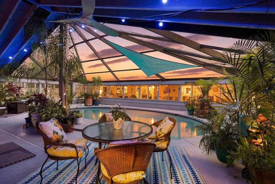 Positioned directly across from the bay and protected by a dedicated park, this exceptional residence offers permanent, unobstructed water views--a rare and highly sought-after setting where no future construction will ever compromise your outlook. This well-appointed home features 4 bedrooms and 3 bathrooms, complemented by a spacious two-car garage and a thoughtfully designed screened and covered pool enclosure--perfect for year-round enjoyment and effortless entertaining. The interior has been tastefully updated with a focus on both luxury and functionality. The kitchen showcases granite countertops, a five-burner gas cooktop, and double ovens, ideal for elevated everyday living. Bathrooms have been fully updated, while the living space is anchored by a striking electric fireplace- with a custom handcrafted black walnut mantle and shelving. A newly renovated balcony enhances the home's indoor-outdoor lifestyle.

Wake up to sweeping views of the Choctawhatchee Bay from the primary suite, and enjoy the same stunning backdrop from the living and dining areas. While the property does not include a private dock, convenient public bay access is just a short walk away--perfect for paddleboarding, kayaking, and fishing.

Additional features include a workshop, storage building, and greenhouse, offering versatility for hobbies or storage. The pool enclosure is a durable, heavy-duty structure with both covered and screened sections. Hurricane-impact windows on the main level front and side provide added peace of mind.

One of the property's most compelling advantages: no HOA and no fees. Bring your boat, RV, and all your toys--this home offers complete freedom with significant cost savings. An 8-foot privacy fence enhances seclusion, and a separate well supports the irrigation system.

Located on a quiet, well-maintained street surrounded by high-end homes, this property combines luxury, privacy, and long-term view protection--making it a standout opportunity for buyers seeking a distinctive coastal lifestyle.