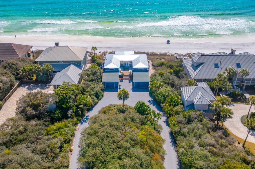 Experience a rare opportunity to own a nearly ¾-acre beachfront homesite on the coveted west end of Scenic Highway 30A. With an impressive 75 feet of pristine Gulf frontage, this exceptional property offers unobstructed, panoramic views of the Gulf and a sense of space and privacy that is increasingly hard to find along the coast. Elevated approximately 26 feet above the beach, the homesite captures sweeping vistas in both directions, along with refreshing coastal breezes and a naturally private setting. A secure bulkhead is already in place, and ownership extends to the mean high-water line, further enhancing the value and long-term enjoyment of this remarkable stretch of shoreline.

The existing beach cottage offers a comfortable and inviting retreat, thoughtfully positioned to maximize the view. Recently updated with a new roof and fresh, bright exterior paint, the home embodies the timeless charm of a quintessential Old Florida beach cottage. With its relaxed character and nostalgic coastal feel, it perfectly captures the essence of classic 30A living.

Inside, the main living space opens to a stunning Gulf backdrop, creating an effortless connection between indoor living and the natural beauty beyond. The home features three well-sized bedrooms and two bathrooms, including a primary suite with Gulf views that shares a bath with a spacious guest room. On the opposite side of the home, an additional bedroom and bath provide added flexibility and convenience. Both bathrooms offer exterior access, ideal for coming and going from the beach. A full-width deck spans the back of the home, offering the perfect setting for morning coffee, sunset gatherings, and everything in between. Two one-car garages provide ample storage for beach gear, bikes, and more.

Whether you envision enhancing the existing structure or designing a custom beachfront estate, the size, elevation, and frontage of this property provide an exceptional canvas for creating something truly special.

Ideally located just moments from Gulf Place, you'll enjoy convenient access to some of 30A's favorite dining, shopping, and entertainment, all while enjoying the privacy and scale of an estate-sized Gulf-front setting. Opportunities like this are few and far between!