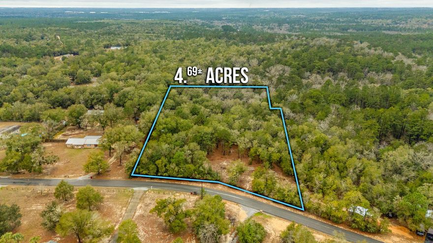 Welcome to 4.69 acres of OPPORTUNITY! Discover the perfect blend of privacy, potential, and INVESTMENT opportunity with this 4.69-acre parcel. Partially cleared at the road, and ready for your vision, this property offers a head start whether you're looking to MAXIMIZE IT'S BUILDING POTENTIAL or BUILD YOUR DREAM HOME. For INVESTORS, the acreage offers the exciting possibility of dividing into three separate parcels -- creating multiple build opportunities and strong resale potential. With ample space and flexibility, the land would also make an IDEAL HOMESITE with room to spread out, add a workshop/barn, garden, or simply enjoy peaceful surroundings. Whether you're planning your forever home or your next smart investment, this property delivers space, versatility, and VALUE. Opportunities like this don't come around often -- bring your plans and make it yours!