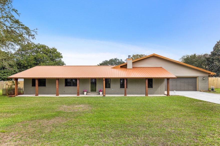 Amazing 5-bedroom brick home on a rare 0.70-acre lot in the heart of Destin with no HOA, offering space, privacy, and modern updates. This thoughtfully updated residence boasts a remodeled open kitchen with granite countertops & stainless steel appliances. No carpet throughout, just durable tile & luxury vinyl plank flooring, paired with fresh interior paint, creates a move-in-ready, clean aesthetic. This 3,508 sq ft home is designed for comfort, security, and peace of mind, with a new metal roof (2022), impact windows, and a Generac 24 kW whole-house generator. Additionally, the home is in Flood Zone X, meaning flood insurance is not required. The backyard retreat is designed for entertaining, complete with a heated pool, hot tub, grilling station, gazebo for outdoor dining, and an expansive pool deck surrounded by a large fenced yard for ultimate privacy. 

Inside, enjoy three cozy fireplaces, in the living room, den, and primary suite, along with updated bathrooms with new vanities and showers. A large front porch welcomes guests, and the 2-car garage with additional driveway parking for 4 vehicles ensures ample space for family and visitors.

Lifestyle and location are unbeatable! From this home, Joe's Bayou is less then 2 miles away, where you can launch your boat and be at Crab Island in just minutes, making spontaneous water adventures quick and easy. Additional nearby Destin attractions include HarborWalk Village, Norriego Point, Captain Leonard Destin Park, and Mattie Kelly Recreation Area and Pier. Daily conveniences like Publix and dining favorites such as McGuire's Irish Pub, Boshamps, Harbor Docks, and Marina Café are all within 5 miles from the home. 

This home offers a rare combination of a large, private lot, modern updates, and unbeatable access to Destin's waterways and attractions, a true opportunity to enjoy the ultimate Destin lifestyle!