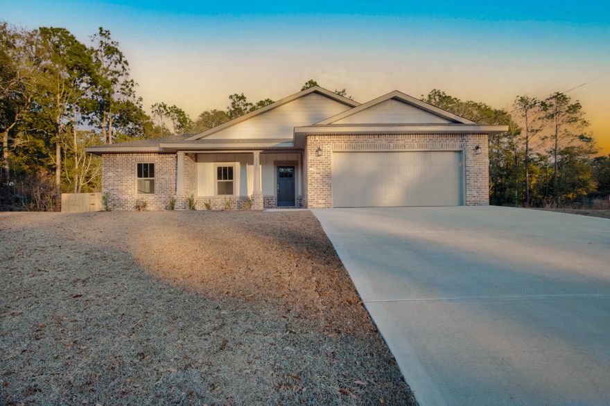 This exceptional new home features many upgrades throughout. Clad with the timeless durability of brick, cement fiber board accents, and an architectural shingled roof. Interior offers luxury vinyl plank in the common areas, visually pleasing neutral tile in the baths and laundry room, and carpet in the bedrooms. Custom paint color is accented with a wide baseboard, beautiful crown molding, and spectacular tray ceiling accents in the master bedroom, dining and entry area. Transom windows over the hall entryways provide a high-end custom touch. Stainless steel appliances including refrigerator, stunning shaker style cabinets, and granite throughout finish the home exquisitely.