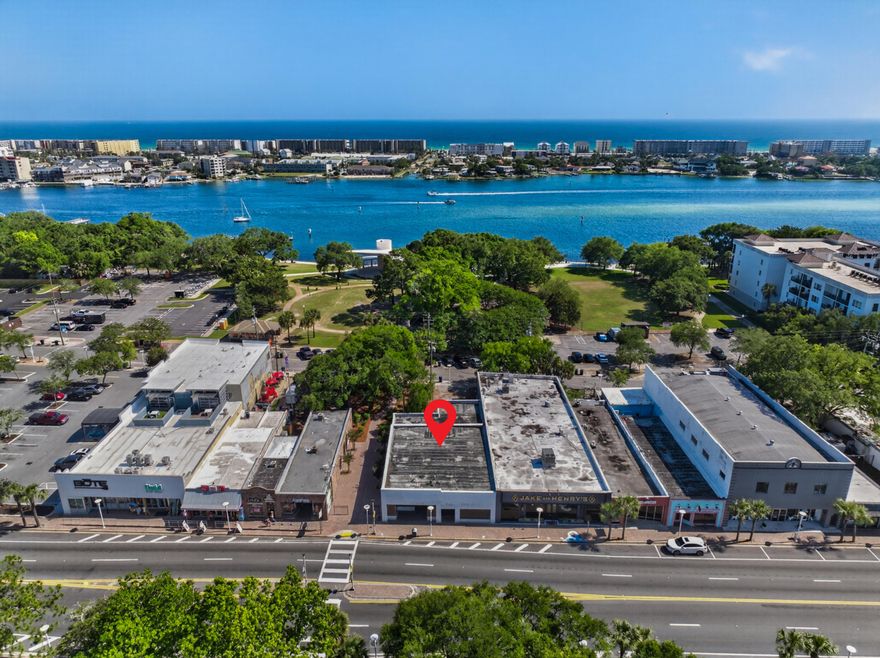 Prime commercial opportunity in the heart of downtown Fort Walton Beach at 142-144 Highway 98 SE. Offering approximately 4,275 total square feet, this versatile property features a huge open layout that can function as one expansive space or easily be divided into two separate units. The interior currently includes multiple office areas, two bathrooms, and abundant open space, allowing flexibility for a wide range of uses including retail, office, restaurant, showroom, entertainment, or other income-producing concepts.
Positioned directly across from The Landing Park, this high-visibility location benefits from strong traffic, excellent exposure, and proximity to the waterfront, restaurants, events, and downtown activity. Unique potential exists for a rooftop bar or entertainment venue, subject to city approval, creating an incredible opportunity to capitalize on water views and the growing downtown atmosphere.
Whether you are an owner-user, investor, or developer, this property offers outstanding flexibility and long-term upside in one of downtown Fort Walton Beach's most recognizable commercial corridors.