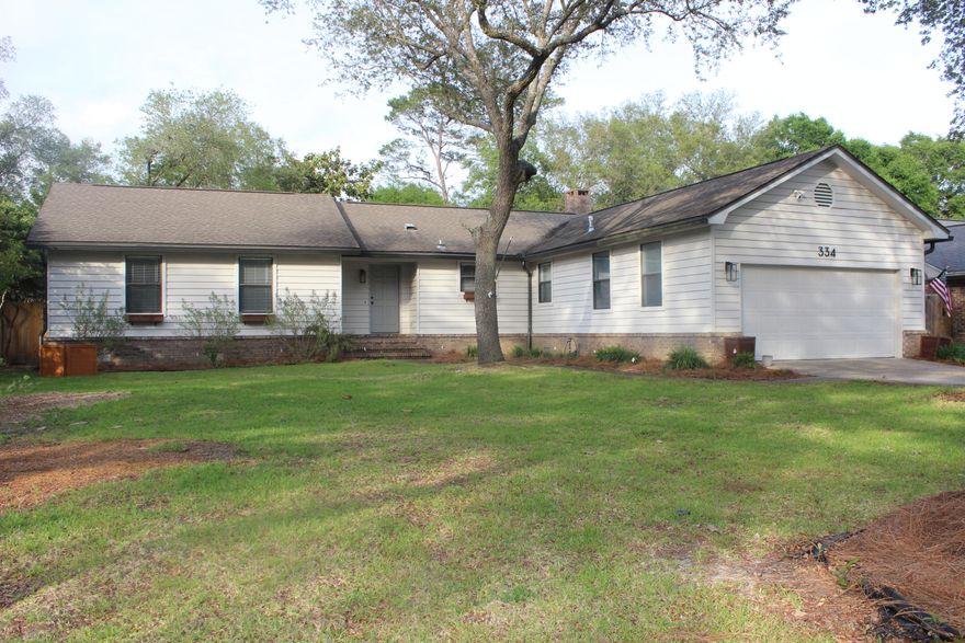 3 bedroom, 2 bath home in desired Bluewater Bay.  Home features hardwood floors through out the living areas and continue down the hall and into the bedrooms. Plenty of storage closets in the foyer, hall and bathroom. The kitchen boasts stainless steel appliances, to include a newer stove and range hood, granite counters and is open to the dining room and family room that features a cozy fireplace. Spacious laundry room with tile flooring. You access this home's backyard through the laundry area. There is a great side deck for entertaining and grilling. Backyard has a fire pit and open space. No smoking or vaping. Dogs only will be considered by owner with a non-refundable pet fee.