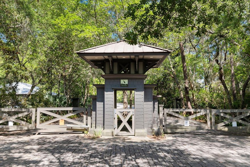 Estate lots of this caliber along the 30A corridor are extraordinarily uncommon. This exceptional .41-acre homesite in The Estuary offers more than just land - it's the foundation for the life you've been planning. Tucked within the Point Washington State Forest and fronting Choctawhatchee Bay, The Estuary is a gated enclave of only 40 homesites and offers residents tranquility amongst old-growth natural beauty, enduring privacy, and premier lifestyle amenities that cannot be replicated. All just minutes from 30A's world-class beaches, acclaimed dining, boutique shopping, and coastal recreation.
Within the neighborhood itself, this premier lot stands apart. It borders the community boardwalk and bay dock offering glimpses of the Bay, commands nearly an entire cul-de-sac, and is surrounded on all sides by protected conservation land with no shared property lines - ensuring a level of privacy and sanctuary that is truly one of a kind.
Custom home plans by acclaimed architect Geoff Chick convey with the property. A detailed survey is available upon request.