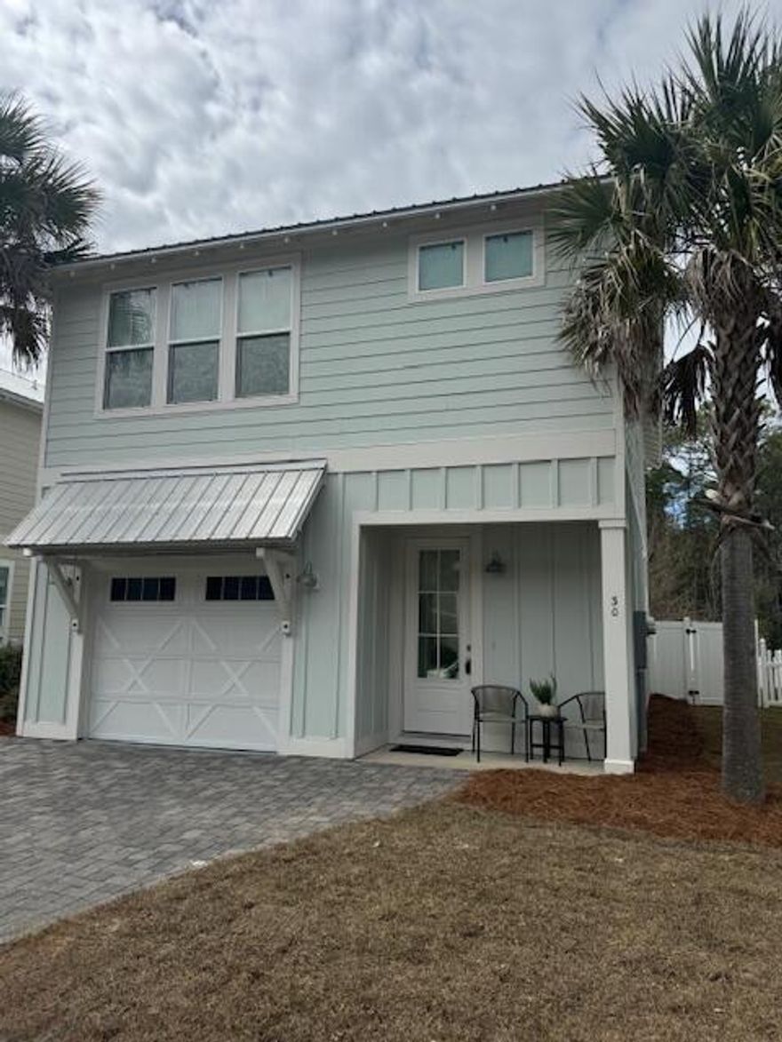 $10,000 Seller flex credit to Buyer for Closing Cost and/or Down Payment. 
One block from the Bay and close to schools, beaches, restaurants, and shops of 30A. This open floor plan, has 1,777 sq ft, 3 bedrooms, 2 full baths, 1 half bath, fenced in back yard, patio, and single garage. The main floor with 9' ceilings, shiplap accents, ceramic wood flooring on the first floor & new LPV upstairs. Half bath on 1st floor for guest. The large quartz peninsula with counter seating & lovely Dining Area makes room for everyone. The 2nd floor Master suite with walk in closet, sitting area, soaking tub, separate shower, and double vanities. Two guest rooms, a full bath with tub/shower configuration and over-sized laundry room complete the second floor. Private community pool and walking distance to the 331 Bay Park, Farm&Fire, The Bay & N. Beach Social restaurant. Also, catch the Free Shuttle to Seaside from the Park & Ride on 331!