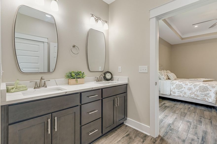 Step into this completed new construction home offering style, space, and value! Located on over a half-acre lot, it features a privacy fence, no HOA, seller-paid closing costs, and a FREE 1-year home warranty--truly move-in ready. Built by a trusted hometown builder, this Modern Farmhouse includes a stacked stone exterior, custom cabinetry, quartz countertops, and wood-look tile throughout. The flexible 5th bedroom is set up as an office with a barn door, with option to add a closet and standard door. The open layout is perfect for entertaining, and the spacious back porch is ideal for relaxing or hosting BBQs. Enjoy low county taxes, lower insurance, and quality craftsmanship throughout.