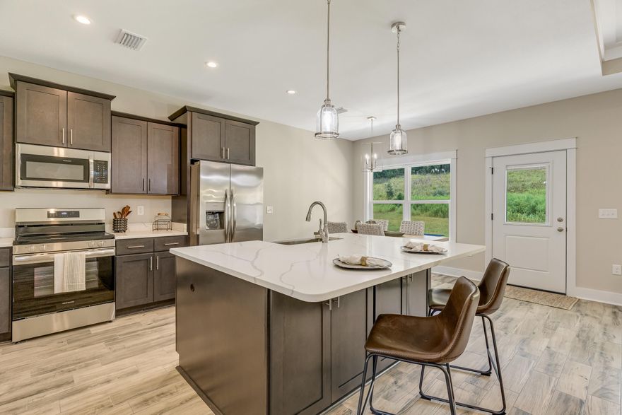 Step into this completed new construction home offering style, space, and value! Located on over a half-acre lot, it features a privacy fence, no HOA, seller-paid closing costs, and a FREE 1-year home warranty--truly move-in ready. Built by a trusted hometown builder, this Modern Farmhouse includes a stacked stone exterior, custom cabinetry, quartz countertops, and wood-look tile throughout. The flexible 5th bedroom is set up as an office with a barn door, with option to add a closet and standard door. The open layout is perfect for entertaining, and the spacious back porch is ideal for relaxing or hosting BBQs. Enjoy low county taxes, lower insurance, and quality craftsmanship throughout.