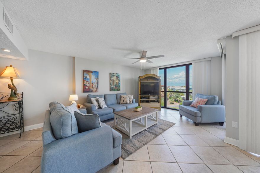 AFFORDABLE PRICE FOR BEACH LIVING! This 2-bedroom, 2-bath condo is sold fully furnished and offers all the comforts needed for a relaxing beach retreat. Recent updates include fresh paint, HVAC, new flooring, and renovated bathrooms. Enclave is a gated community situated directly across the street from the beach with deeded beach access. Community amenities include a swimming pool, volleyball, tennis and pickleball courts, BBQ area, and more.