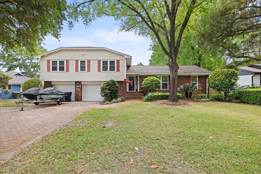 Welcome to 218 Yacht Club Dr in Fort Walton Beach--a charming split-level home nestled beneath mature trees in an established neighborhood. This well-maintained property features a classic brick exterior, spacious driveway, and inviting curb appeal. Inside, you'll find a functional layout with multiple living spaces, ideal for everyday living and entertaining. The large outdoor screened deck is great for entertaining and the admire the beautifully landscaped grounds. The generous yard with sparkling pool has plenty of room to relax or play. Conveniently located near local parks, dining, shopping, and just minutes from the beautiful Emerald Coast beaches, Hurlburt Field, and Eglin AFB. A perfect place to call home!