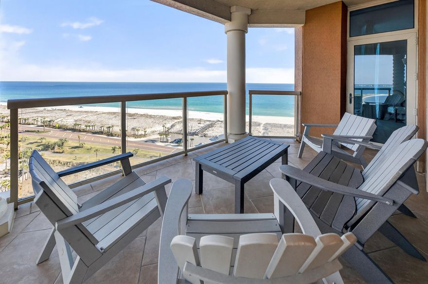 Welcome to luxury coastal living at Portofino Island Resort! This stunning, upgraded twelfth floor residence in Tower 5 showcases breathtaking 180-degree views of the Gulf and Santa Rosa Sound. The residence is being sold FULLY FURNISHED, offering a seamless move-in or rental ready opportunity. With rental history coming in at over $100k, this property offers excellent short term rental potential! This unit offers an expansive balcony (44x17ft) designed for entertaining or taking in the sparkling water views and sunsets. Inside, the open-concept areas are anchored by Gulf views and enhanced by high ceilings and crown molding. Luxury vinyl plank flooring runs throughout the entire unit, complemented by fresh, neutral paint. The kitchen is beautifully appointed with quartz countertops, white cabinetry, sleek backsplash, a breakfast bar, and an adjacent dining area. Each bedroom is privately positioned on its own corner of the unit and each features its own en suite bathroom. The primary suite offers direct balcony access, a spacious walk-in closet, and a beautifully upgraded tiled walk-in shower, double vanities, and a water closet. A second bedroom also enjoys balcony access, a walk-in closet, and an en suite bath with a tiled standing shower. The third bedroom is generously sized to accommodate two beds, includes two closets, and features a bathroom with a tub/shower combo. A half bath sits just off the main living area for guest use. Additional highlights include two assigned covered parking spaces, an assigned storage unit, and a built in grilling area on the balcony. Portofino Island Resort offers unparalleled amenities including direct access to both the Gulf of Mexico and the Santa Rosa Sound, multiple pools and spas, a full-service spa, a state-of-the-art fitness center, tennis courts, and on-site dining. Only minutes from the dog park and all that Pensacola Beach has to offer, this condo will make you feel at home and on vacation all year long!