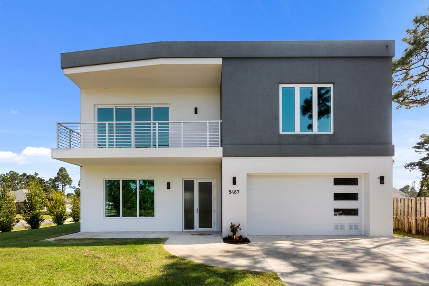 Welcome to 5487 Cimmeron Ct in Gulf Breeze, with 4 bedrooms and 3 and 1/2 bathrooms, where modern design meets one of the most durable and thoughtfully built homes in the area. This beautiful home features over 10ft ceilings and large oversized rooms with plenty of closet/storage and space for your family. Tucked away on a quiet cul-de-sac, this brand-new, never-lived-in home offers a rare opportunity to enjoy the Gulf Coast lifestyle with peace of mind and long-term value.

Built with Insulated Concrete Form (ICF) construction and impact-resistant windows and doors, this home is designed for strength, energy efficiency, and year-round comfort - making it one of the most resilient and secure homes available in Gulf Breeze.