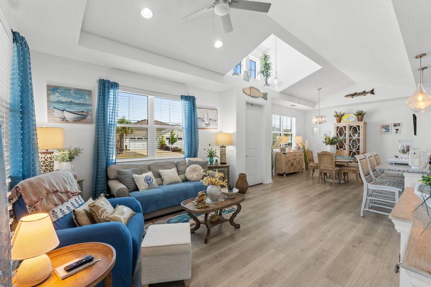 Step into the best of low-maintenance, resort-style living in this barely lived-in Aloha Cottage! Perfectly situated in Phase 5 near the golf cart underpass, you're just minutes from the vibrant Town Square amenities of Latitude Margaritaville Watersound -- one of Northwest Florida's premier 55+ active adult communities. Nestled on a fabulous oversized corner lot, this charming 2-bedroom, 2-bath Florida cottage with a versatile flex room delivers 1,472 square feet of thoughtfully designed living space -- complete with upgrades galore, including granite countertops, elevated cabinetry, and beautiful laminate flooring throughout. The spacious kitchen flows seamlessly into the dining and family rooms, while a large laundry room and a lovely screened-in porch add everyday comfort and coastal charm. Just 7 miles from pristine Gulf beaches and situated within a golf-cart-friendly community, you'll enjoy world-class amenities set along the Intracoastal Waterway -- including a resort-style pool, two-story waterfront restaurant, state-of-the-art fitness center with indoor pool and spa, tennis and pickleball courts, and a lively bandshell for concerts and outdoor events. With two garage spaces, furnishings negotiable, and a brand-new Publix coming soon nearby, this turnkey cottage is ready to become your perfect primary retreat or sun-soaked second home. Live where others vacation -- your coastal dream starts here!