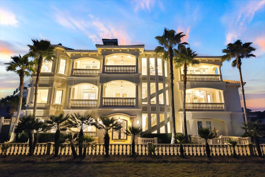 Positioned within the gated enclave of Pelican Circle along Scenic Highway 30A, this exceptional coastal residence offers a rare opportunity just moments from the Gulf's white sand shoreline and the rare coastal dune waters of Camp Creek Lake. Tucked behind private gates and set within one of the area's most discreet beachside corridors, the property pairs architectural presence with a location defined by both exclusivity and natural beauty. Spanning more than 5,500 square feet, the home is thoughtfully designed to balance expansive gathering spaces with private retreats, all oriented to capture sweeping views and seamless indoor-outdoor living. An elevator provides effortless access to each level, ensuring both convenience and long-term livability without compromise. In 2025, the residence underwent a comprehensive interior refresh, including full interior repainting, all new designer furnishings, updated lighting throughout, and new pool equipment, enhancing both its aesthetic appeal and operational performance.

The arrival experience is both striking and intentional. A circular drive and custom pergola frame the approach, leading to a dramatic iron entry. Inside, soaring ceilings and generous proportions create an immediate sense of scale. The first floor is designed with both entertainment and functionality in mind, featuring a spacious bunk room ideal for hosting multiple guests and a dedicated movie theater that transforms evenings into a private cinematic experience.

At the center of the outdoor living experience, a secluded courtyard is enclosed by a tall stone wall, offering privacy rarely found this close to the beach. A heated pool and spa, complemented by a built-in grotto and cascading waterfall, create a resort-style setting equally suited for quiet mornings or elevated entertaining.

The second level introduces the main living space, anchored by a chef's kitchen and dining area designed for gathering. Multiple balconies extend the living areas outward, capturing Gulf views from the front and serene pool views from the rear. Two additional king suites share a well-appointed bath with a walk-in shower and dressing area, providing comfort and privacy for family or guests.

On the top floor, a glass-enclosed fitness room, secondary laundry, and powder bath add convenience and flexibility. A guest primary suite enjoys its own private balcony and spa-inspired bath, while the main primary suite commands the home's most compelling Gulf views. Complete with an expansive terrace, custom dressing room, heated bathroom floors, soaking tub, and walk-in shower, it serves as a true private sanctuary above the coastline.

Primely positioned within gated Pelican Circle, just steps from the beach and minutes from the natural beauty of Camp Creek Lake, this recently refreshed residence offers a compelling blend of lifestyle, privacy, and long-term value. With exceptional scale, resort-caliber amenities, elevator access, and meaningful upgrades completed in 2025, it represents a rare offering along 30A for those seeking refined coastal living with enduring investment potential.