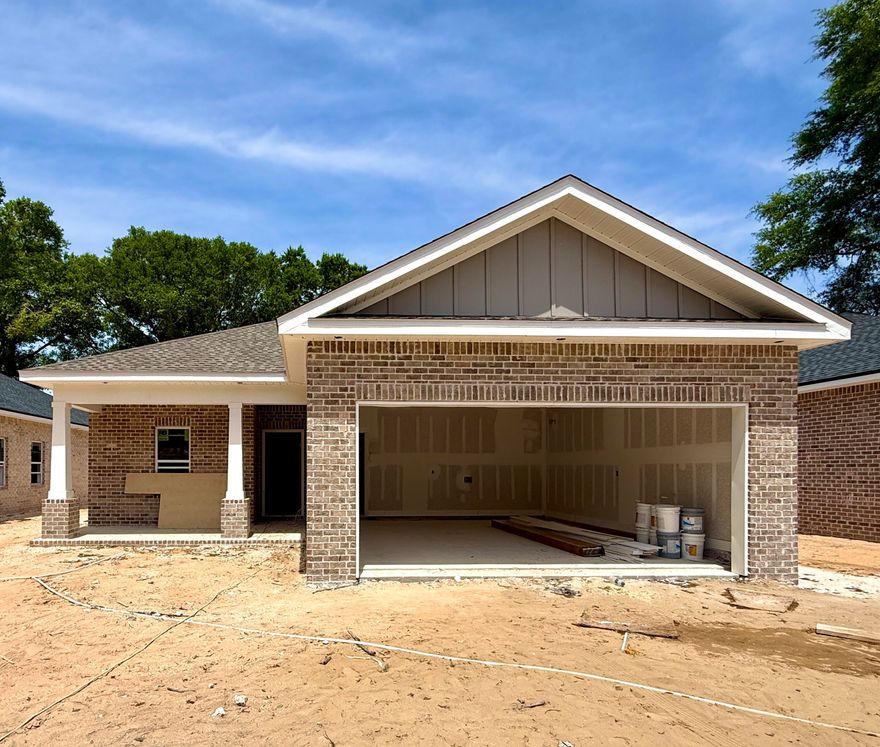 Builder Memorial Day Sale!!! Builder is offering 3 buying options so you can choose what best fits your needs!**Under Construction - Can Close by 5/22** Forget Spring cleaning! Ditch the dust rag in your old house and step into your brand new home. Builder offering $10,300 in credits to be used however the buyer would like! Centrally located in Niceville, this 4-bedroom 2-bath home offers you all of the creature comforts you'd come to expect from Grand American Homes. As you walk in, you'll notice a front dining area perfect for family meals and Holiday celebrations. The kitchen features stainless steel appliances with a pantry to fit all your kitchen needs. Unwind with a movie in your open living room before retiring to the primary bedroom/bathroom, where you can decompress in a hot shower in your tiled walk-in shower. Plenty of heads can rest in the three remaining bedrooms positioned conveniently near the hallway bathroom. Enjoy the evenings on your covered back porch overlooking your large backyard! Let's not forget that this home is conveniently located near the heart of Niceville just minutes to shopping, restaurants & parks! **The photos in this listing are from a different home with the same floor plan built by the same builder. Colors and finishes may vary.**
