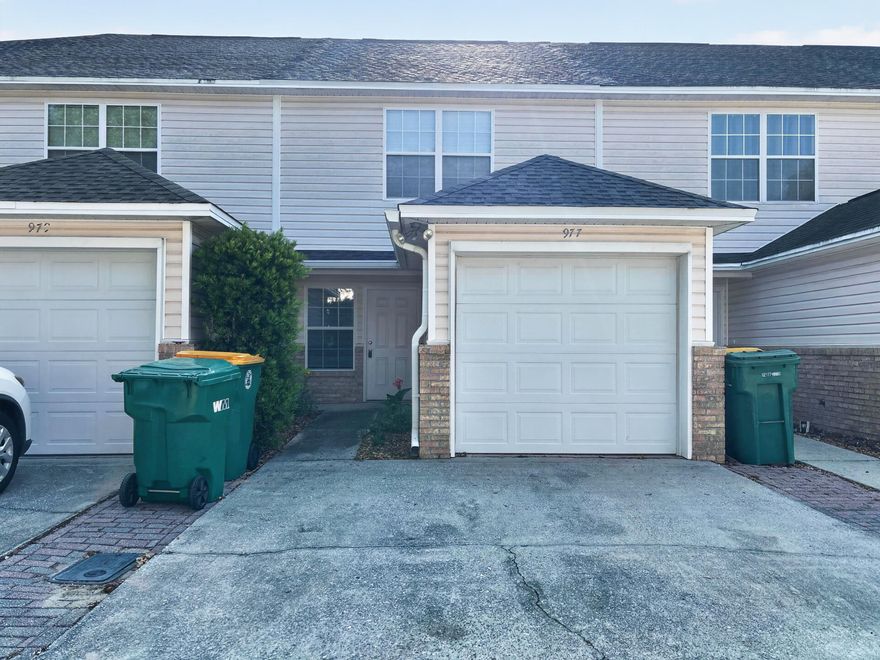 Charming 2-bedroom, 2.5-bathroom townhouse located in the heart of Fort Walton Beach at 977 Scenic Oak Ln. This home offers a perfect blend of comfort and convenience with a spacious, open-concept layout connecting the living, dining, and kitchen areas--ideal for both entertaining and everyday living. Large windows provide plenty of natural light, creating a bright and inviting atmosphere throughout. Both bedrooms offer ample space and serve as peaceful retreats, while the additional half bath downstairs adds convenience for guests. A washer and dryer are included in the unit (not warranted). Sorry, no pets. Enjoy the perfect combination of coastal living and modern comfort in this well-located townhouse. All Coastal Realty Services residents are enrolled in the Resident Benefits Package (RBP), which includes renter's insurance, HVAC air filter delivery (for applicable properties), and a resident rewards program, along with additional benefits.