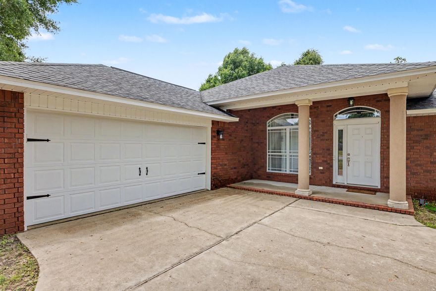 Situated on a spacious corner lot, this beautifully cared-for home stands out with timeless design, thoughtful details, and a layout that feels both refined and functional. A long driveway and inviting front porch create a welcoming first impression, while the side-entry garage adds to the home's clean curb appeal.

Inside, you'll find tall ceilings, elegant living spaces, and a floor plan that offers more character and separation than many newer homes built today. The kitchen features granite countertops, solid wood cabinetry, ample prep space, and a cozy breakfast nook perfect for everyday dining. A separate formal dining room provides additional space for gatherings and entertaining.

One of the secondary bedrooms includes glass doors, making it an ideal option for a home office, study, or flex room. The spacious primary suite offers a relaxing retreat with both a soaking tub and separate shower.

Step outside to enjoy the fully fenced backyard with a newer fence and plenty of room to unwind, entertain, or let pets play freely. Conveniently located in Crestview with no HOA, this home combines charm, space, and functionality in a setting that truly feels established and welcoming.
