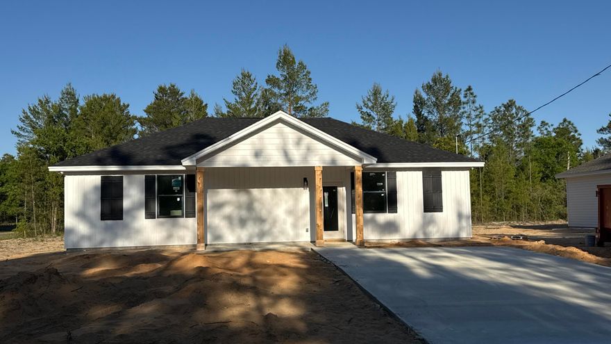 Brand-new construction in the desirable Sunny Hills! This beautifully crafted 3-bedroom, 2-bath home offers over 1,200 sq. ft. of comfort and style. Step inside to an open-concept layout featuring 9' ceilings with a vaulted living area, creating a bright and spacious feel throughout the main living spaces.  Home is built with Impact rated doors and windows, and roof is foam insulated. 

The kitchen is designed with all-wood cabinetry, stainless steel appliances, and a functional layout perfect for everyday living. Durable LVP flooring runs throughout the entire home, offering a seamless look and easy maintenance.

The master includes private bath with his and her vanities and a well-sized closet, while two additional bedrooms provide flexibility for family, guests, or a home office