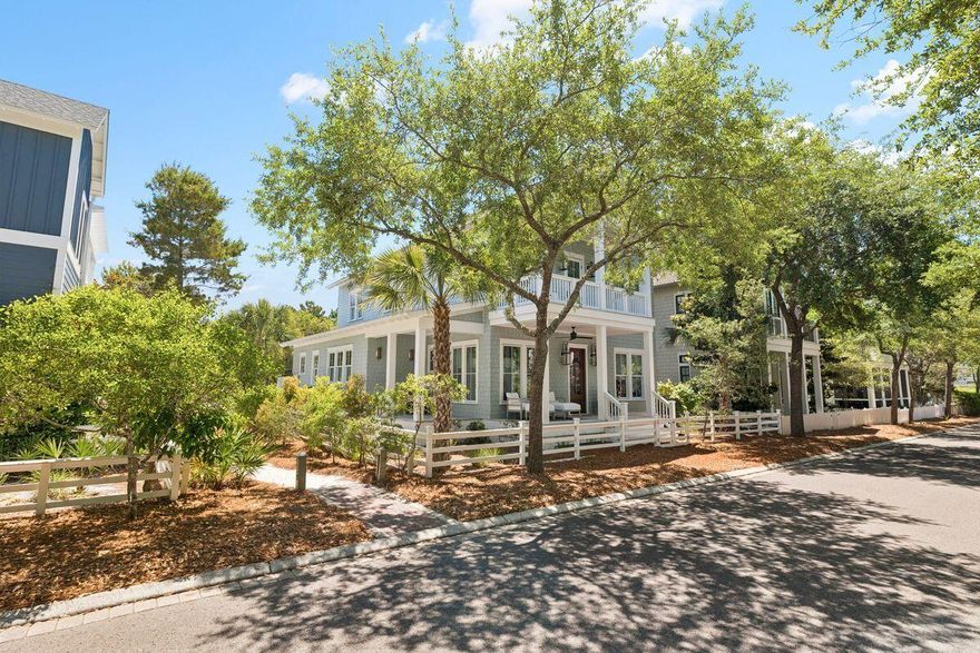 A quiet sense of refinement reveals itself from the moment you arrive, set behind the private gates in the Main Gate of Watersound Beach, where thoughtful architecture and seamless indoor-outdoor living define a home designed for both retreat and gathering. Built in 2022 and meticulously maintained by its original owner, this residence spans nearly 3,200 square feet of carefully considered living space by Allison Ramsey Architects, where every detail feels purposeful and enduring. A welcoming front porch sets the tone, leading into a grand living area anchored by a well-equipped kitchen designed with connection in mind. White oak hardwood flooring, tongue-and-groove walls, and substantial cedar beams lend warmth and character, while a gas fireplace framed in white brick creates a natural focal point. The kitchen is equipped with a Sub-Zero refrigerator, double ovens, six-burner cooktop, wine cooler, and a generous walk-in pantry, offering both beauty and function.

Just beyond, more than 850 square feet of porch space extends the living experience outward, creating a seamless transition between interior comfort and the coastal air. A screened porch with a second gas fireplace and vented grill invites relaxed evenings and effortless outdoor dining, while the private pool offers a refreshing escape after a day at the beach, complemented by a convenient pool bath and adjacent powder room.

The first level also includes a well-appointed guest suite with an ensuite bath, a mudroom-style laundry space with brick flooring, and thoughtful access points designed for everyday ease. Upstairs, the primary suite serves as a private retreat with its own porch, dual closets, and a spa-like bath featuring double vanities, a soaking tub, custom tiled walk-in shower, and a separate water closet. A second primary suite on this level provides flexibility and privacy, while an additional ensuite bedroom, including a bunk room with handcrafted detail, ensures comfortable accommodations for guests. A second laundry area serves the upper level, enhancing the home's livability. Every bedroom enjoys a private bath, creating a true sense of comfort and autonomy throughout.

Positioned on a homesite bordered by lush vegetation, the property enjoys direct access to a network of winding boardwalks that lead through preserved natural landscapes and onward to the turquoise-hued water. The setting is both peaceful and connected, offering proximity to multiple beach accesses, parks, fitness facilities, and gathering spaces, all within a thoughtfully designed coastal environment.

Offered furnished with select exclusions and impeccably maintained, the home also features a two-car garage and generous driveway parking. With more than a mile of private white sand shoreline, miles of scenic boardwalks, and golf cart paths leading to the beach, this is a setting defined by space, privacy, and a distinctly natural coastal experience -- all just moments from the dining and lifestyle offerings along 30A.