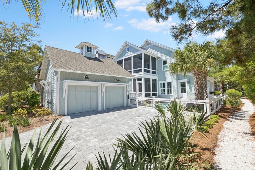 A quiet sense of refinement reveals itself from the moment you arrive, set behind the private gates in the Main Gate of Watersound Beach, where thoughtful architecture and seamless indoor-outdoor living define a home designed for both retreat and gathering. Built in 2022 and meticulously maintained by its original owner, this residence spans nearly 3,200 square feet of carefully considered living space by Allison Ramsey Architects, where every detail feels purposeful and enduring. A welcoming front porch sets the tone, leading into a grand living area anchored by a well-equipped kitchen designed with connection in mind. White oak hardwood flooring, tongue-and-groove walls, and substantial cedar beams lend warmth and character, while a gas fireplace framed in white brick creates a natural focal point. The kitchen is equipped with a Sub-Zero refrigerator, double ovens, six-burner cooktop, wine cooler, and a generous walk-in pantry, offering both beauty and function.

Just beyond, more than 850 square feet of porch space extends the living experience outward, creating a seamless transition between interior comfort and the coastal air. A screened porch with a second gas fireplace and vented grill invites relaxed evenings and effortless outdoor dining, while the private pool offers a refreshing escape after a day at the beach, complemented by a convenient pool bath and adjacent powder room.

The first level also includes a well-appointed guest suite with an ensuite bath, a mudroom-style laundry space with brick flooring, and thoughtful access points designed for everyday ease. Upstairs, the primary suite serves as a private retreat with its own porch, dual closets, and a spa-like bath featuring double vanities, a soaking tub, custom tiled walk-in shower, and a separate water closet. A second primary suite on this level provides flexibility and privacy, while an additional ensuite bedroom, including a bunk room with handcrafted detail, ensures comfortable accommodations for guests. A second laundry area serves the upper level, enhancing the home's livability. Every bedroom enjoys a private bath, creating a true sense of comfort and autonomy throughout.

Positioned on a homesite bordered by lush vegetation, the property enjoys direct access to a network of winding boardwalks that lead through preserved natural landscapes and onward to the turquoise-hued water. The setting is both peaceful and connected, offering proximity to multiple beach accesses, parks, fitness facilities, and gathering spaces, all within a thoughtfully designed coastal environment.

Offered furnished with select exclusions and impeccably maintained, the home also features a two-car garage and generous driveway parking. With more than a mile of private white sand shoreline, miles of scenic boardwalks, and golf cart paths leading to the beach, this is a setting defined by space, privacy, and a distinctly natural coastal experience -- all just moments from the dining and lifestyle offerings along 30A.
