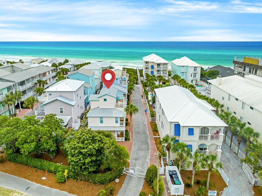 Enjoy the evening sunsets and Gulf breezes from the balconies of Moon Glow, a lovely family-friendly, 3-level home. Only a 150ft to the beach and steps from the community pool. Come and take advantage of all the amenities this great vacation home has to offer.

Enjoy all the comforts of home with large flat-screen TVs in the living room and all the bedrooms, modern appliances in the kitchen, and cozy bedding to relax and unwind after a day of fun in the sun.

The 1st floor features an open-concept entertaining space: the living area with a sleeper sofa and the dining area with seating for 6.  Also on this main floor you'll find the laundry room and a convenient half bath. The 2nd level is where you will find the main bedroom with a king bed and private porch, and another bedroom with 2 full beds and a large walk-in closet. The 3rd floor tower room boasts a comfy queen bed, a wet bar, and another private porch with stunning Gulf views. All bedrooms have attached private bathrooms.

With great dining options just across the street, and fun shopping destinations within walking distance, you'll find this vacation home a most convenient and comfortable vacation getaway.

Sleeping Arrangements:
Bedroom 1: King bed, tv, vanity area, private balcony access, tub and shower area bathroom
Bedroom 2: 2 Twin Full beds, tv, private balcony access, tub and shower area bathroom Bedroom 3: Queen bed, tv, private balcony access, private bathroom
Sofa in the living room pulls out to a queen bed.