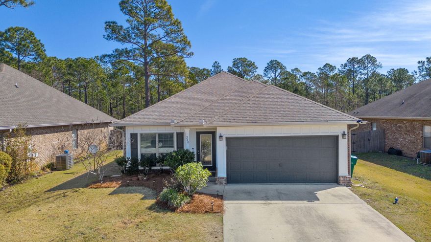 PRIVATE BACKYARD RETREAT backing to Preserve, Under $500K Near 30A!  An immaculate, maintained home with 3 bedrooms, 2 baths with bonus room great for 4th bedroom, office, or workout room. Located in the serene coastal living at Whispering Lake this charming home offers close proximity to beaches, shopping, dining and medical facilities. The large fenced-in yard ensuring privacy with no future development behind. The home has been meticulously cared for with fresh interior paint, luxury vinyl flooring, & new carpet. The expansive living area flows with the spacious kitchen featuring a breakfast bar and dining area. Large master suite with a custom closet, bath with double vanities, walk in shower, and separate tub. The patio has been extended to offer a larger space for outdoor entertaining! The home also includes a double-car garage and showcases a low-maintenance exterior of brick and Hardi-siding. Lots of natural lighting throughout this home. Less than 10 minutes to the World's Most Beautiful Beaches! Enjoy the conveniences of fine and casual dining, shopping, and Sacred Heart Hospital is less than 15 mins away!   Buyer to verify all data and dimensions.