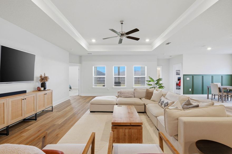 Welcome to one of the most attractive opportunities in the newer Forest Bay community, perfectly suited for the smart and savvy buyer in today's market.

This meticulously cared-for home barely feels lived in. From the moment you step inside, you'll notice the clean, spacious, minimalist layout that today's buyers love. Tray ceilings, recessed lighting, and an open, inviting floor plan create a bright and welcoming space that feels both modern and comfortable.

Step outside to enjoy your private backyard retreat featuring a covered patio and a fully enclosed fence, ideal for relaxing evenings, outdoor dining, or letting pets play safely. One of the most unique features of this property is the front yard view. Instead of neighboring homes, you'll enjoy a peaceful wooded backdrop that is not buildable, offering a level of privacy that originally drew the current owners to this home and is increasingly hard to find.

Located further back within the neighborhood, the home benefits from reduced traffic and a quieter setting, making it feel tucked away while still being incredibly convenient.

Residents of Forest Bay enjoy access to a beautiful community pool and pavilion, perfect for soaking up the Florida sunshine, meeting neighbors, or unwinding after a long day.

Commuting is easy with this centrally located neighborhood, providing a short drive to local military bases, Navarre Beach, Pensacola, and Destin. Whether you're heading west toward Pensacola or east toward the Emerald Coast's famous beaches, this location puts everything within reach. Come see why homes in Forest Bay are becoming some of the most talked-about properties in the area. Be sure to watch for upcoming open house dates and times.

Flexible closing options are available. Whether you need a quick closing or prefer more time, the sellers are happy to work with the buyer's timeline.

Welcome to your new home.