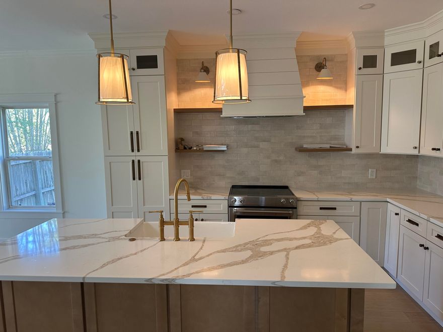 Beautiful remodel on a large lot with a carriage home in Pelican Bay.