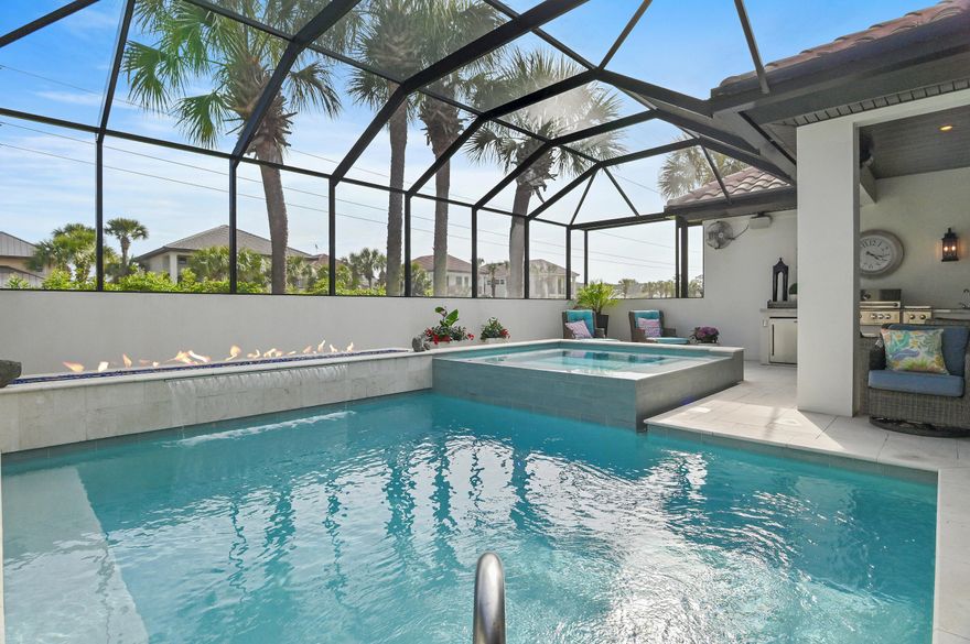 Welcome to 4765 Papaya Park offering the ultimate in outdoor living in the exclusive gated community of Destiny East.  Meticulously maintained as a primary residence, this one-story home is move-in or rental ready, being offered fully furnished and beautifully decorated.  The screened courtyard is the ultimate in outdoor living with an outdoor kitchen/dining area, living area and wonderfully updated pool and spa. Enjoy the  world class amenities including a large club house with a theater, party room, kitchen, and gym. The two lighted tennis courts are also lined for pickle ball. The large pool and hot tub are next to the wonderful children's play ground.  
Located just moments away from the pristine beaches and sparkling gulf waters, this beach house offers the ultimate coastal lifestyle. Enjoy the convenience of nearby amenities, including upscale dining, boutique shopping, and recreational activities. With its prime location and unparalleled beauty, this glamorous beach house is an extraordinary opportunity to live a life of coastal luxury. Don't miss your chance to experience the epitome of refined living by making this exquisite residence your own.