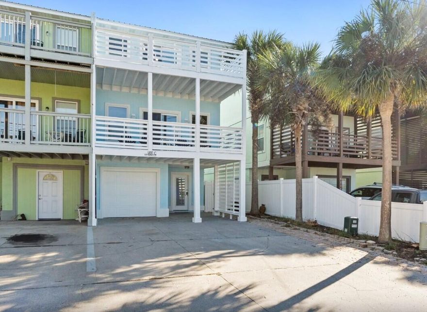 No HOA. Move In Ready!.  Duplex.  Renovated 2025.  3 Bedroom & 3 Bath Residence plus Efficiency Studio/Full Bath. Three story residence has an open living/dining/kitchen. The home features a brand-new roof, new exterior paint, and fresh interior paint.  Fully furnished home with new coastal décor, renovated to meet code, and situated less than two blocks from the white sands of the Gulf of America and its emerald waters! The main residence with spacious 3 large bedrooms, 3 full bathrooms & multiple decks to relax & enjoy the gulf views & beautiful sunsets! One car garage/storage.  In addition to the main residence, a cozy efficiency studio with a fully fenced backyard & private entrance is located on the ground level.   Only 30 minutes to the airport.