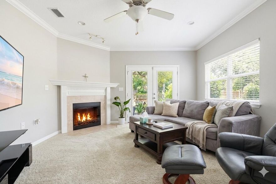 Located in the heart of Fort Walton Beach, this 4-bedroom, 2.5-bath home offers over 2,300 square feet with a layout designed for both everyday living and flexibility just minutes to Okaloosa Island beaches, Hurlburt Field, and Eglin Air Force Base.
Big-ticket updates are already done, including a roof (2024), water heater (2025), downstairs HVAC (2014), and upstairs HVAC (2016). Hurricane window protection is in place, and solar panels will be paid off at closing adding long-term value and efficiency.
The primary suite is located on the main floor, offering privacy and direct access to the covered patio through French doors. The ensuite bath features a double vanity with dressing area, soaking tub, separate shower, and two walk-in closets. Built in 2006, the thoughtfully designed floor plan features a primary suite on the main floor. The primary bedroom includes French doors leading directly to the covered patio. The ensuite bathroom offers a double vanity with dressing area, a soaking tub, separate shower, and two walk-in closets.
The main living area showcases high ceilings and an electric fireplace, flowing into the dining space and kitchen for both everyday use and entertaining.
Upstairs includes three additional bedrooms and a full bathroom, providing separation and flexibility within the layout.
The outdoor space includes a fully fenced backyard, covered patio, storage shed, and room to enjoy the outdoors. Nearby public water access for kayaking adds to the appeal of this centrally located property.