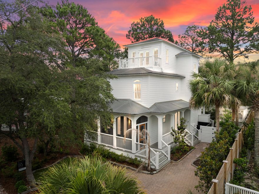 STUNNING RENOVATION 'TO THE STUDS' IN 2023! Spacious, open floor plan with multiple gathering areas perfect for your 2nd home or BEACHHOUSE INVESTMENT PROPERTY! Five minute walk to the beach access & the soon to be new golf cart parking area! Five BR/4 BA sold fully furnished with all new coastal inspired decor, gorgeous hardwood floors, ship-lapped walls throughout! Stunning kitchen w/stainless appliances, tile backsplash, & breakfast bar. Living/dining area opens up to a covered back porch & fully fenced private yard w/six person hot/cold tub, pergola, gas firepit and sitting area! First floor BR opens to a covered, screened-in front porch with swing! Second floor master suite with private balcony w/two bed swings, 2 walk-in closets, separate glass shower/tub/double vanities! NO HOA!