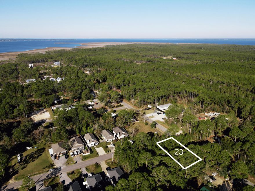 Located in the heart of North Santa Rosa Beach, Lot 23 provides a versatile opportunity for those looking to build or invest in a rapidly expanding area of South Walton. Surrounded by new development and continued growth, this homesite benefits from its proximity to the Choctawhatchee Bay, local boat launches, and the renowned beaches of 30A. Whether you're planning a custom home or adding to your investment portfolio, this lot offers strong potential in a market that continues to gain momentum. Additional contiguous land is available, offering flexibility for expanded plans or future development.