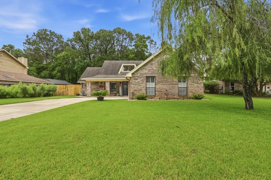 No HOA and beautifully maintained in the highly desirable Overbrook subdivision! This traditional L-shaped brick home offers generous living space, updated finishes, and a large fenced backyard with a wide entry gate for a future pool, boat storage or RV parking. 

The dining area features vaulted ceilings and an open stairway that creates a bright, spacious feel upon entry. Modern light fixtures give the home an updated touch with farmhouse charm. The main living room features a natural stone fireplace, & direct access to the enclosed Florida room.

The enclosed Florida room overlooks the oversized backyard with thick green grass surrounding all sides of the home. 
The kitchen features granite countertops, updated fixtures, and an interior pass-through window overlooking the Florida room and dining area, helping the spaces feel connected while still maintaining dedicated living spaces. 

The primary suite is located on the first floor and features double vanities, granite countertops, jacuzzi tub, separate shower, private water closet, and a walk-in closet. Upstairs, both additional bedrooms also include walk-in closets, making all three bedrooms equipped with walk-in storage. At the top of the staircase, a loft-style sitting area provides flexible space for an office, reading area, playroom, or additional lounge space.

Additional features include a dedicated laundry room with built-in wall niche for storage or decor, smart home security system already installed on doors and windows, new fencing, and a two-car garage that comfortably accommodates two vehicles.

 Located in a family-friendly neighborhood with sidewalks and school bus access throughout the community, this Overbrook home combines space, functionality, and pride of ownership in one of Fort Walton Beach's most established neighborhoods.