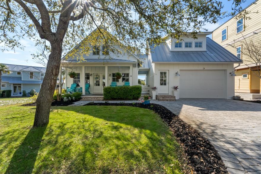 Experience the ease of coastal living in this beautiful Florida beach home, ideally situated just a quick bike ride from the pristine white sands and emerald waters of the Gulf Coast.

Inside, you'll find an open concept layout that's perfect for entertaining, featuring quartz countertops, luxury vinyl flooring, a gas cooktop, and stainless steel appliances. Shiplap accents throughout give the home that clean, coastal feel.

The main home offers 3 bedrooms and 2.5 baths, plus a fully functional carriage house above the 2-car garage. Ideal for guests or additional rental potential.

Located behind the gates of Villages of Blue Mountain, this property works great as a primary residence, second home, or a solid vacation rental opportunity.