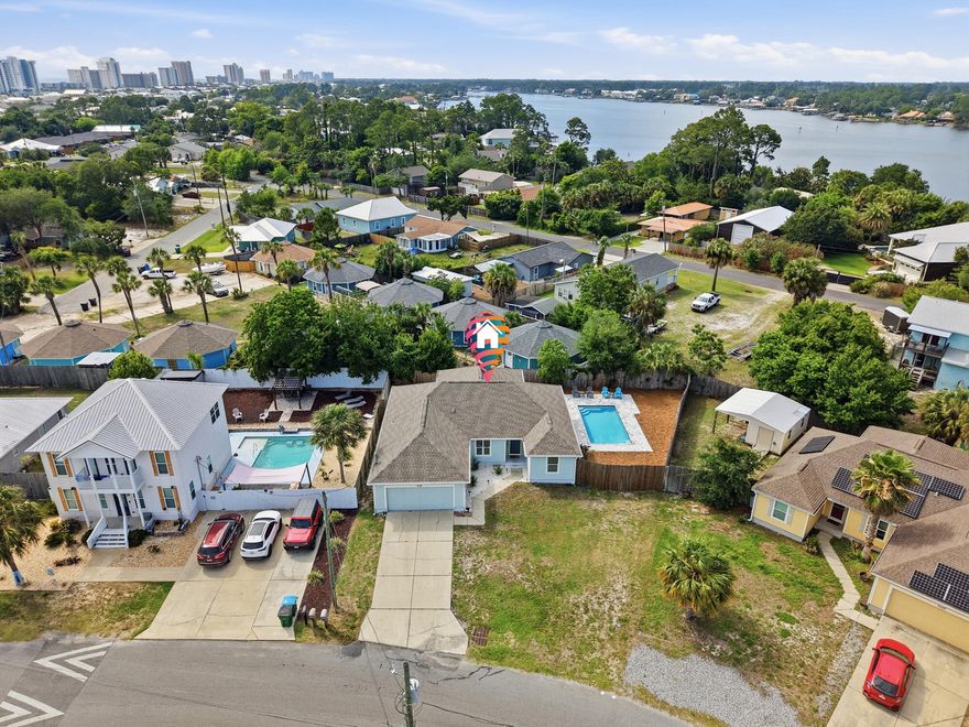 This is a cash flowing machine! Perfectly positioned in Panama City Beach's desirable South Lagoon area, this 3BR/2BA home blends coastal comfort with strong investment potential. Just minutes from Beach Access 7, the home features an open-concept layout, stainless steel appliances, wood-look tile flooring in the main living areas, and a spacious primary suite with Trey ceilings. Step outside to a large covered patio overlooking a brand new heated pool installed in 2025, perfect for relaxing or entertaining. Major updates include a new roof in 2022. Currently operating as a successful short-term rental with over $65,000 in gross revenue already in 2025 and on track to exceed that. Whether you're looking for a primary residence, second home, or income-producing beach property, this one checks the boxes.