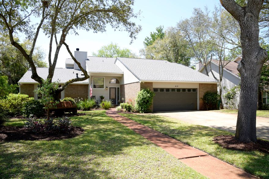 Exquisitely updated 3-bedroom, 2-bath lakefront home located in the highly sought-after Bluewater Bay community. From the moment you enter, you're greeted by elegant marble tile flooring and modern light fixtures that set the tone for the rest of the home. Thoughtful upgrades throughout include rich hardwood floors, updated cabinetry, tall baseboards, and stylish subway tile accents.

The open-concept kitchen has been redesigned for both functionality and flow, seamlessly connecting to the dining area while offering beautiful water views. It features granite countertops, white shaker cabinets, custom pendant lighting, stainless steel appliances, and a spacious walk-in pantry. The inviting living room is highlighted by a charming tiled corner gas fireplace, creating a warm and welcoming atmosphere.

The first-floor master suite is a true retreat, comprised of three distinct spaces: a generous bedroom with sliding glass doors leading to the back deck, a versatile bonus room ideal for an office, dressing area, or media space, and a luxurious en-suite bathroom. The bathroom showcases marbled tile, granite countertops, updated lighting, white shaker cabinets, a walk-in shower, jetted tub, dual vanities, two walk-in closets, and a private water closet.

Upstairs, two additional bedrooms provide ample space, along with a beautifully updated bathroom featuring marbled tile, granite surfaces, a seated walk-in shower, and a convenient linen closet.

Step outside to enjoy the expansive back deck, complete with skylights and stretching the full length of the home--perfect for relaxing and taking in the serene lake views. Even the garage has been upgraded, offering extensive storage with 5-foot-tall cabinets lining an entire wall.

Ideally located near top-rated schools, shopping, Eglin AFB, and the stunning white sandy beaches of Destin, this exceptional home offers both comfort and convenience. Contact us today for a showing!